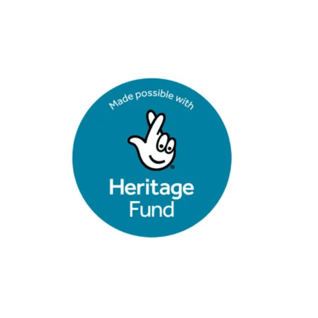 Heritage Fund logo in blue circle with graphic of fingers crossed alongside text